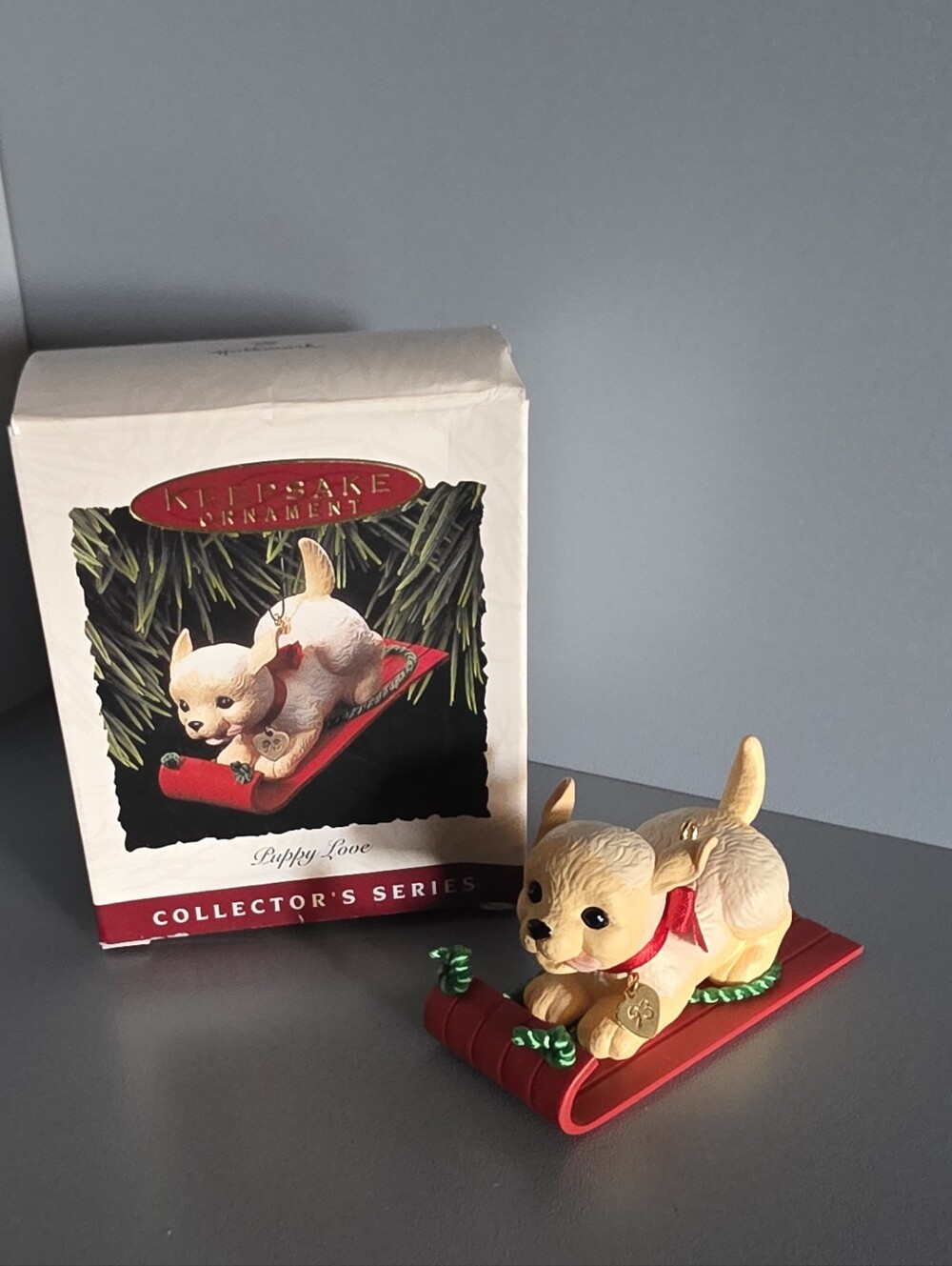 Hallmark Cream Puppy on Red Sled Ornament